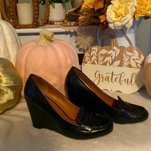 Nine West Penny loafer style wedges black in color leather